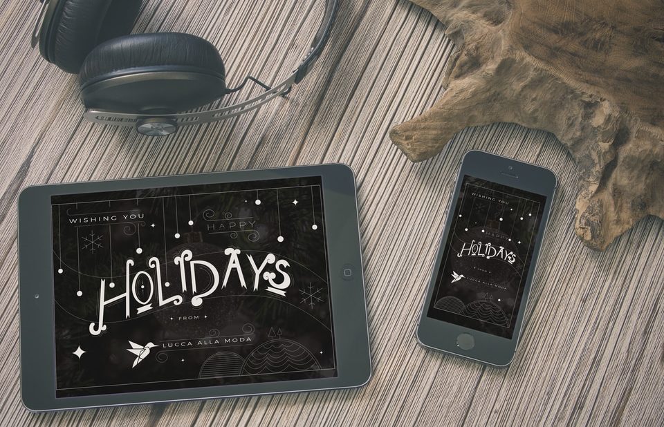 holidays design graphic on tablet and phone, PPC management, SEO services