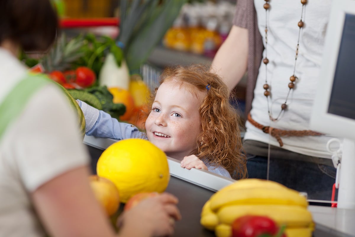 child eye level to candy in checkout lane